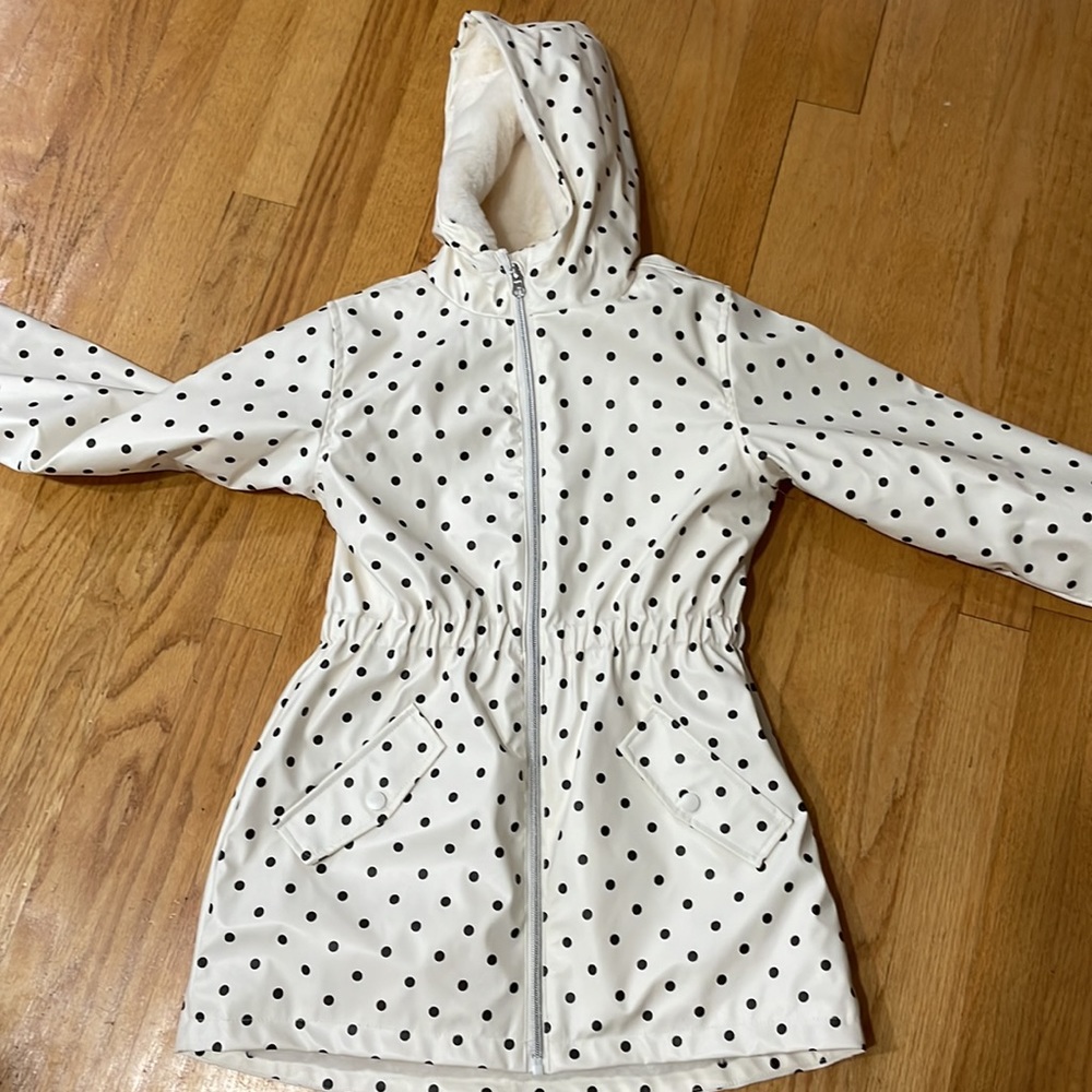 Raincoat Cream and black polka like new condition.